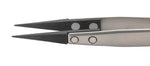Close up of pointed carbon tweezer tips