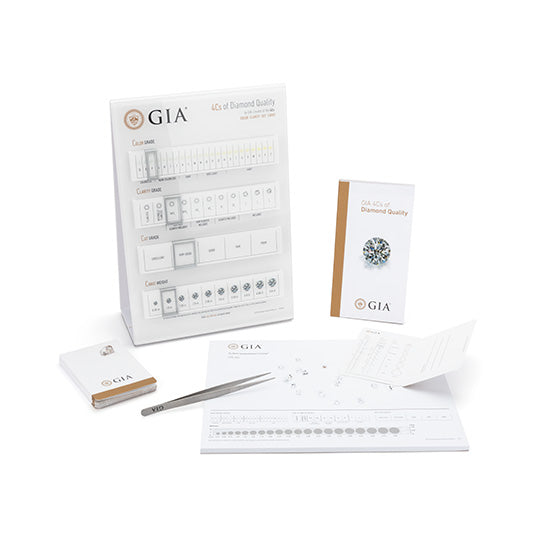 Counting tool, sorting pads, pocket cards, and brochure included in Diamond kit, displayed with tweezers