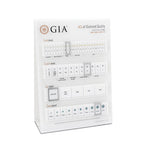 Tabletop tool with color, clarity, cut grade, and carat weight scales with interactive sliding selector 