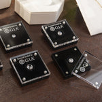 Group of four Loose Diamond Display Cases on counter